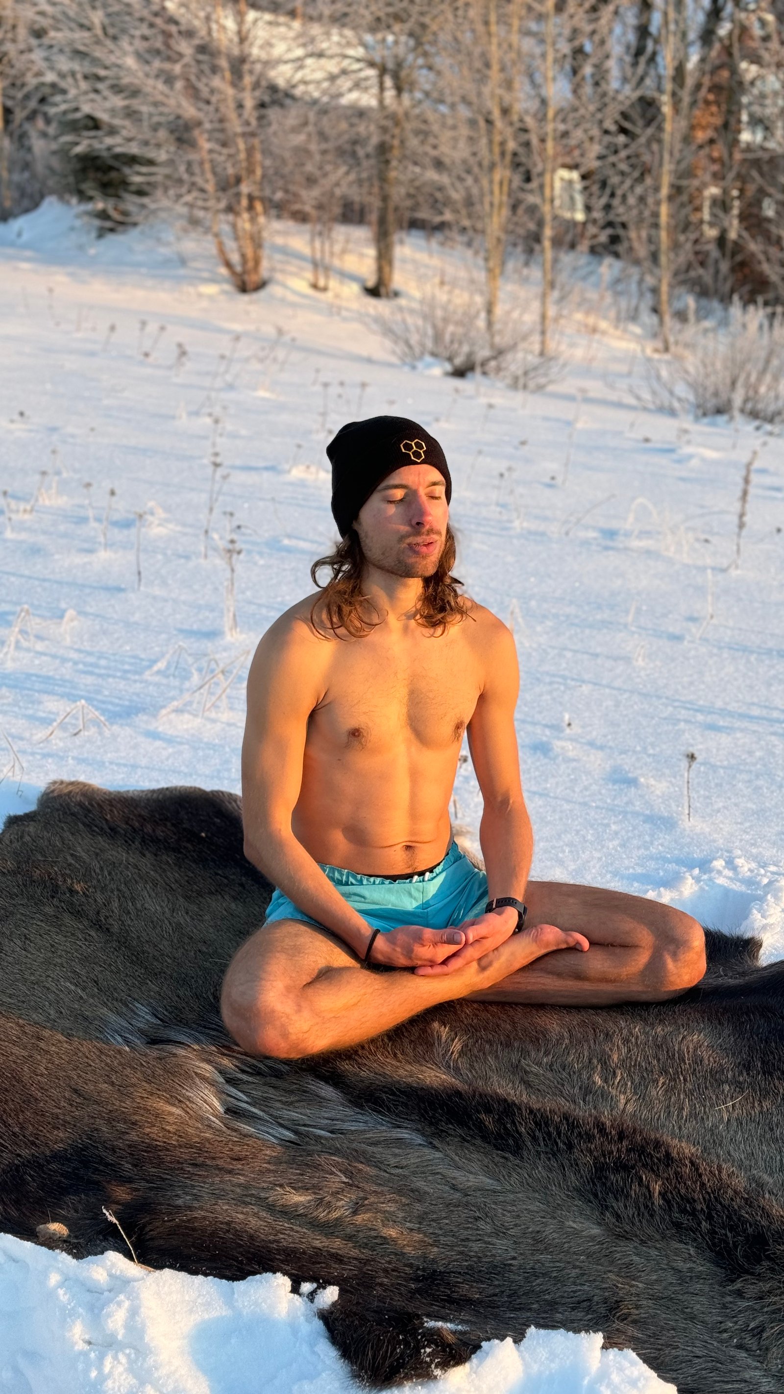 Filip meditating outdoors in winter